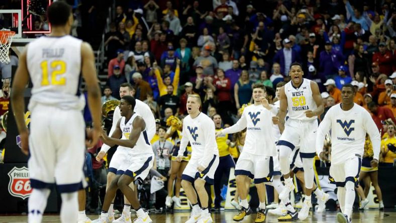 With Wisconsin not making the 2018 NCAA Tournament, West Virginia holds the longest streak in the nation for qualifying for both March Madness and a bowl game.
