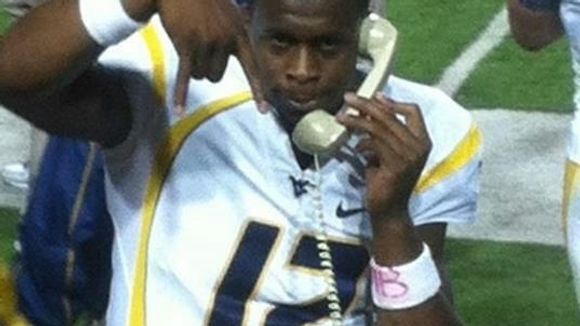 Tom Herman, Geno smith horns down